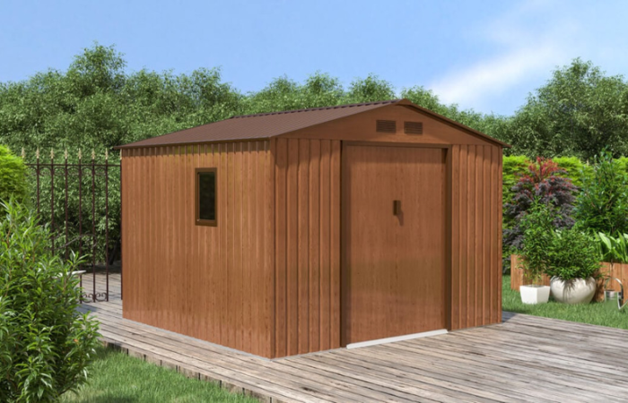  Casă de grădină maro amplasată &icirc;n grădină pe o suprafață pavată 